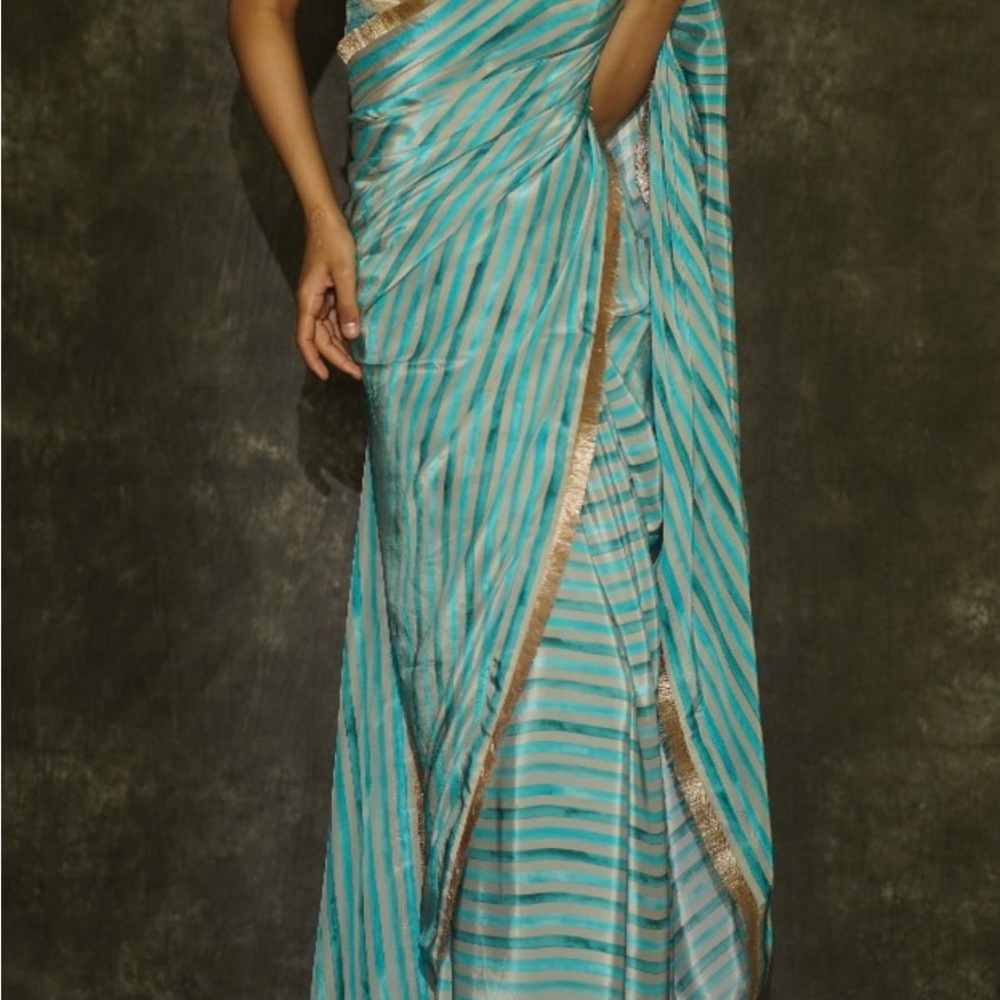 Elegant Blue and Gold Striped Saree